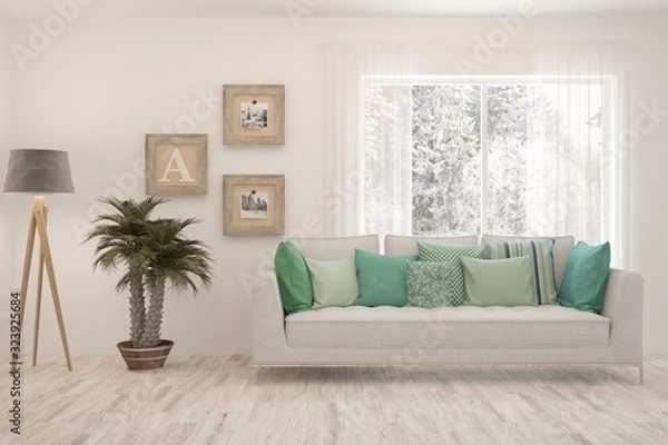 Fototapeta Stylish room in white color with sofa and winter landscape in window. Scandinavian interior design. 3D illustration