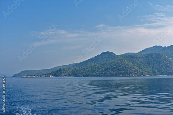 Fototapeta blue water, blue sky, mountains. aegean. Turkey