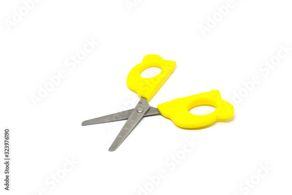 Fototapeta Yellow scissors isolated on white background
