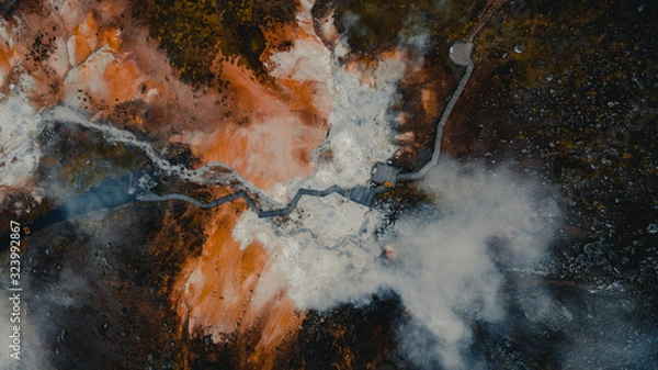 Fototapeta Drone view of Seltun geothermal field in Krysuvik,Iceland.Volcano geothermal volcanic activity drone video - Iceland landscape nature showing volcanic active hot springs and mud pots. 