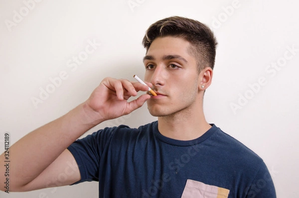 Obraz Young man with cigarette