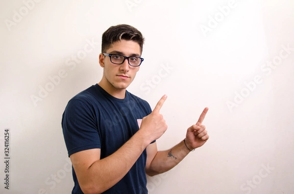 Obraz Young man pointing with his fingers