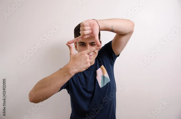 Obraz Young man doing taking a picture