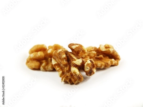 Fototapeta Walnuts towards white