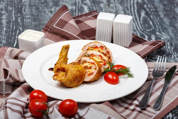 Obraz baked stuffed chicken thigh with vegetables