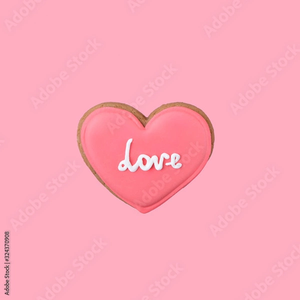 Fototapeta One sweet pink heart on pink background. Valentine's day minimal creative concept. close up. copy space