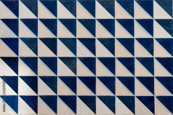 Obraz Vintage square tiles with  geometric pattern on building facade