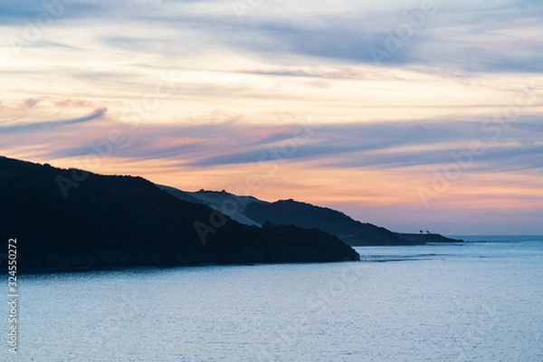 Obraz sunset over the sea at ahipara
