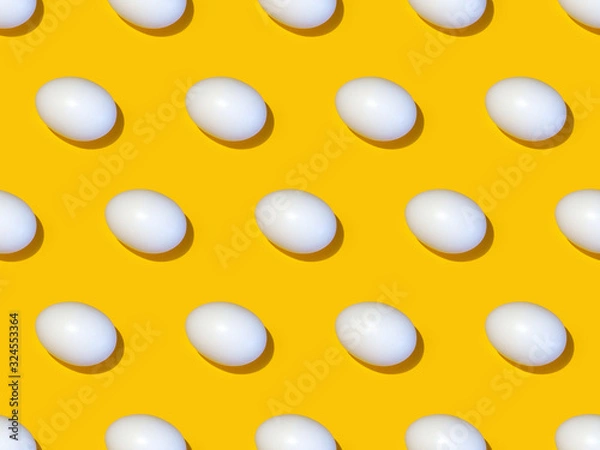 Fototapeta Eggs seamless pattern isolated on a yellow background
