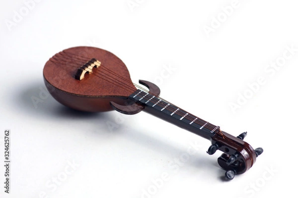 Obraz detail of rebab, arabic musical instrument, isolated on white background. Flat lay