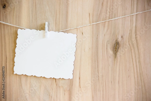 Obraz white sheet on clothespins hang on thread