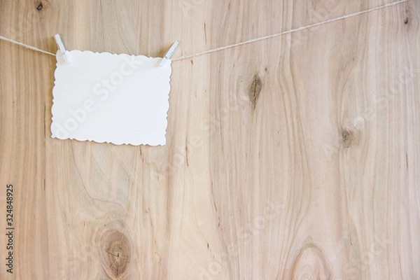 Obraz white sheet on clothespins hang on thread