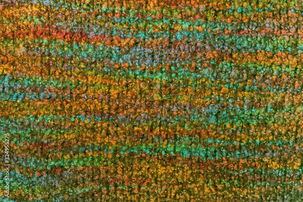 Fototapeta Sweater or scarf fabric texture large knitting. Knitted jersey background with a relief pattern. Wool hand- machine, handmade.