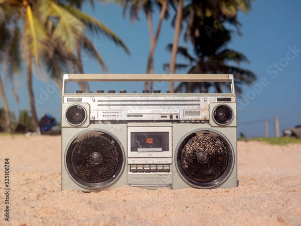 Obraz Tape recorder in sea foam and waves.