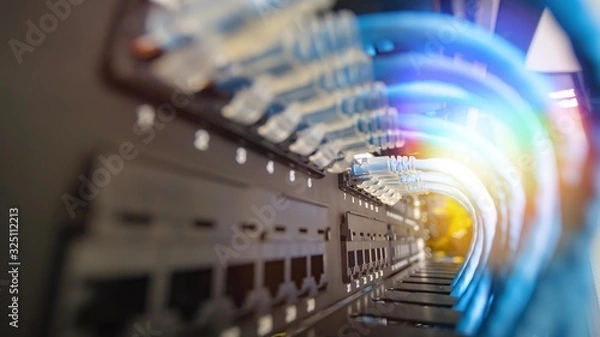 Obraz Blue network cable system in network rack have beautiful lighting and center picture focusing