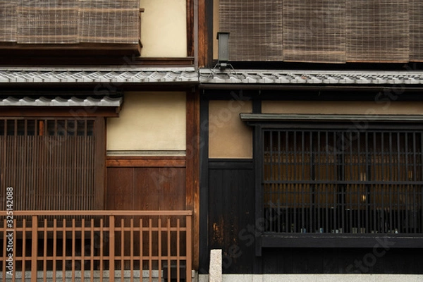 Obraz wooden wall of window and old house in Japan. low key and soft focus.
