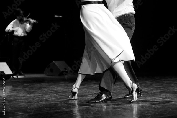 Obraz Graceful lines of legs of Argentina tango dancers