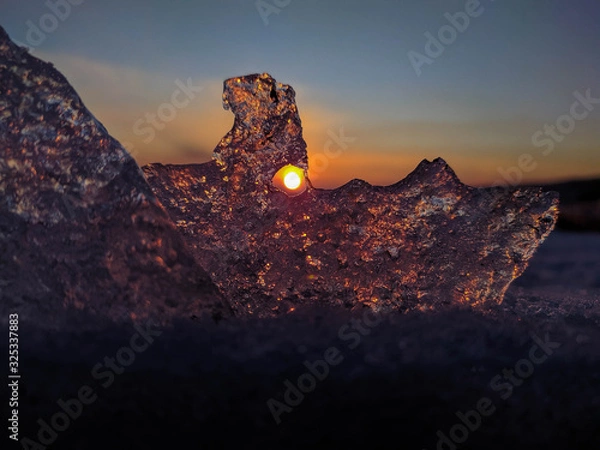Obraz Beautiful winter sunset through the ice