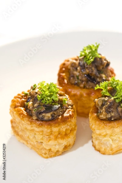 Fototapeta Vols-au-vent stuffed with snails and mushrooms