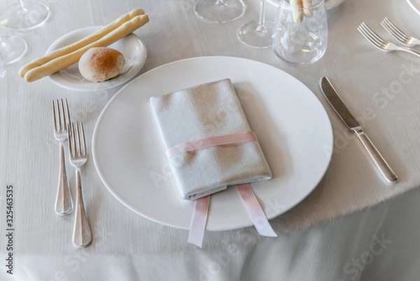 Fototapeta Detail of a table set for a banquet