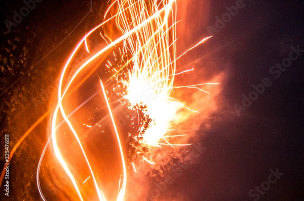 Obraz Abstract orange fire sparkler light streaks