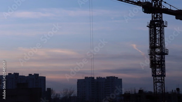 Obraz construction crane at sunset