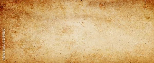 Fototapeta Old brown paper parchment background design with distressed vintage stains and ink spatter and white faded shabby center, elegant antique beige color