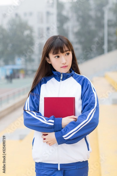 Obraz  long-haired girl wearing school uniform