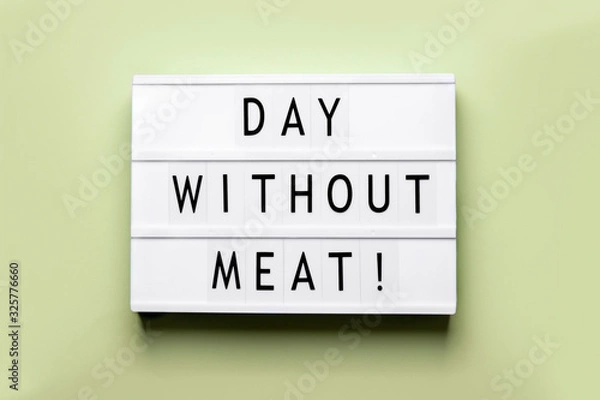 Obraz holiday international day without meat the inscription on the lightbox which is on a green background