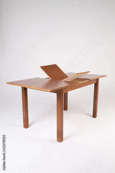 Fototapeta Single brown folding table with empty surface on an isolated white background