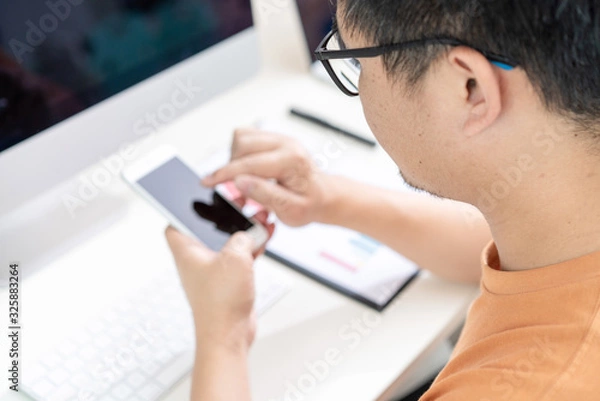 Obraz Tired Asian men work at home