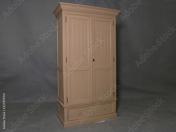 Fototapeta Classy and Modern Luxury Wooden Storage Cabinet for Home Interiors Furniture in Isolated Background
