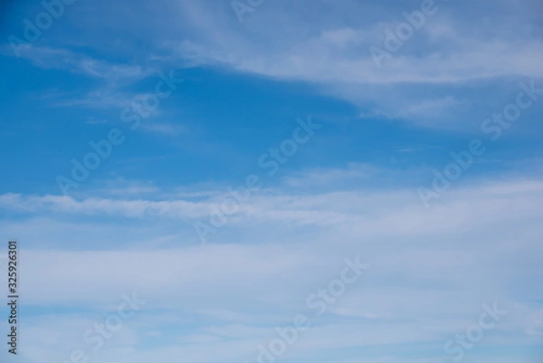 Obraz Background with clouds on blue sky