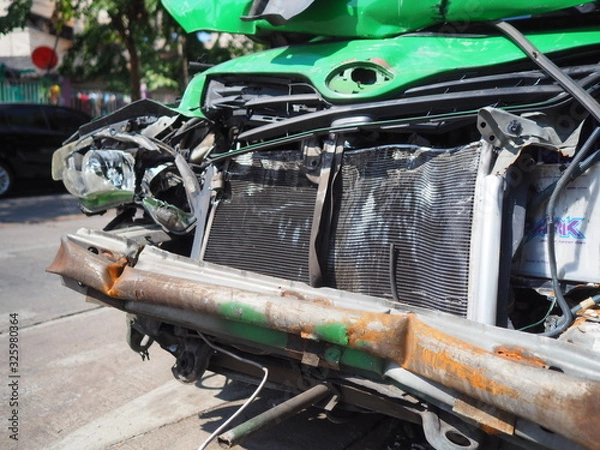 Obraz Car crash accident on road, Damaged automobiles after collision in city, Front of car get damaged by accident on the road.