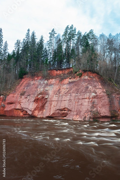 Obraz Red cliffs by running river