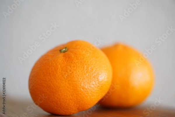 Obraz Mandarinen auf einem Küchenbrett