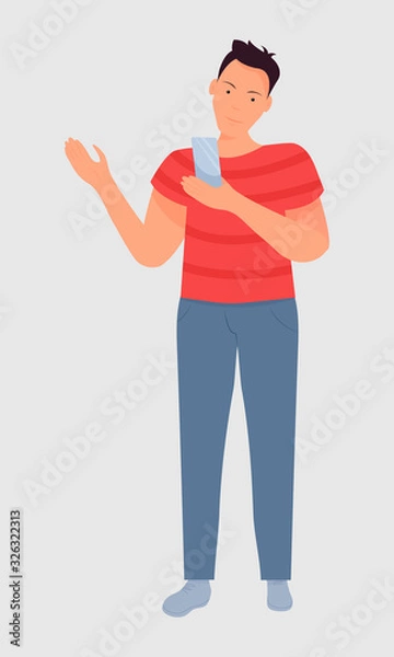 Fototapeta full length young man looks at the screen of a mobile phone. Vector. Separate on a white background. Flat cartoon style. The concept of online communication, work through the phone, using applications