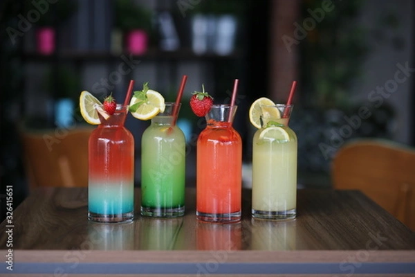 Fototapeta colorful fruit cocktails on table