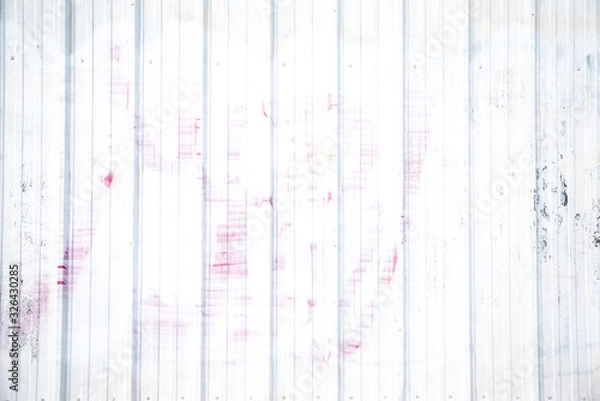 Fototapeta White wall with covered graffiti