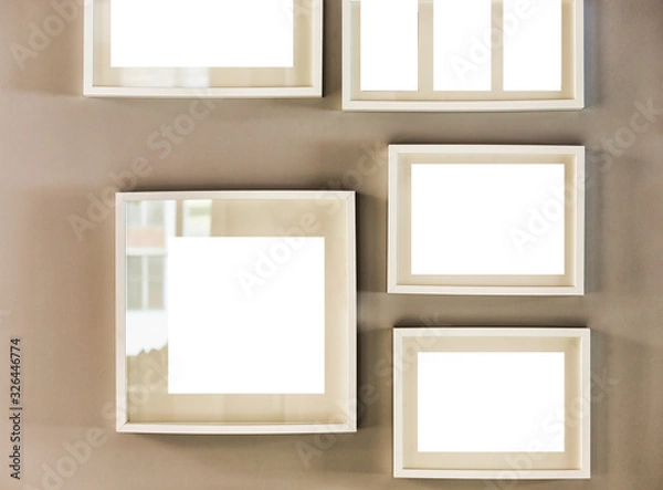 Fototapeta Close up photo of picture frames on the wall in new apartment