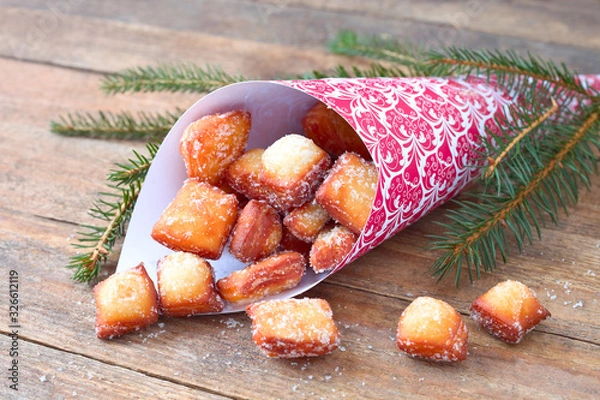 Obraz Schmalzgebäck in einer Tüte	