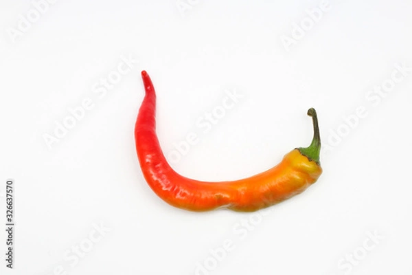 Fototapeta isolated red and yellow chili peppers on a white background.