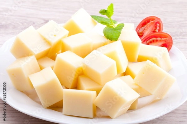 Obraz Kostki żółtego sera