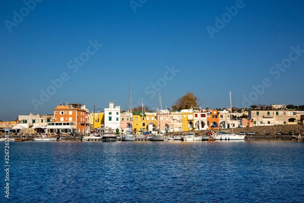 Fototapeta Procida (Italy) - Chiaiolella bay with its colored houses is a tourists attraction