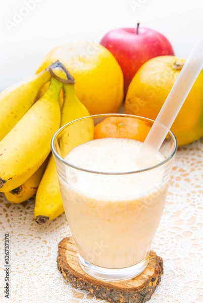 Fototapeta ミカンとバナナのジュース