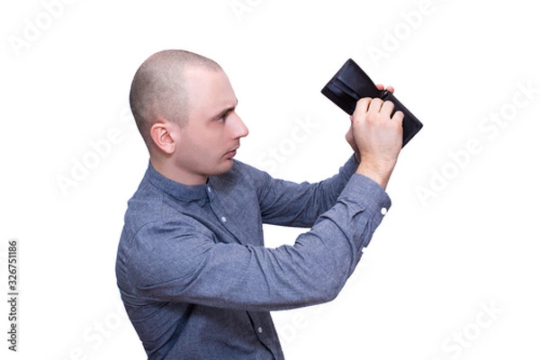 Fototapeta Man with an empty wallet