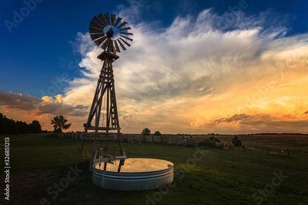 Obraz windmill at sunset before a storm