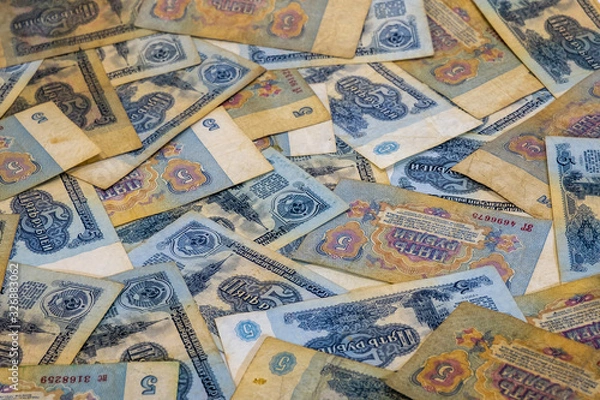 Fototapeta Background from five-ruble banknotes of Soviet money of the 1961 sample.
