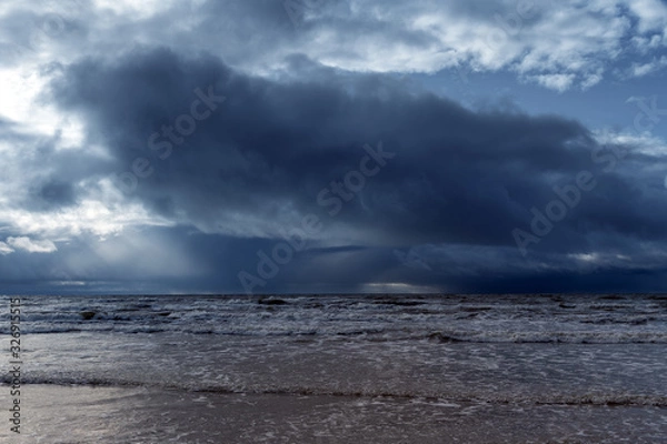 Obraz Dark clouds over Baltic sea.