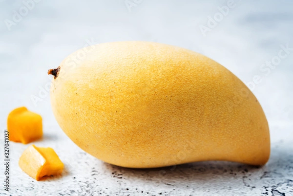 Fototapeta Ripe Thai mango fruit with slices